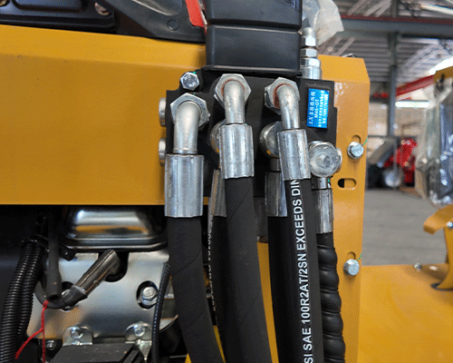 Cargador articulado compacto